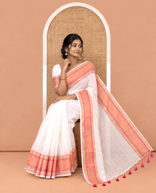 Cream Plain Khadi Mul Cotton Saree, Complemented by Contrast Pink Border, a Self-Pallu, and Has No Blouse