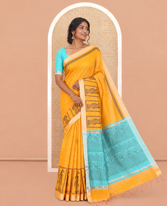 Yellow Semi-Katan Silk Saree, Adorned with Human Figurine, Copper Zari Border, Contrast Warli Pallu, and a Contrast Blouse