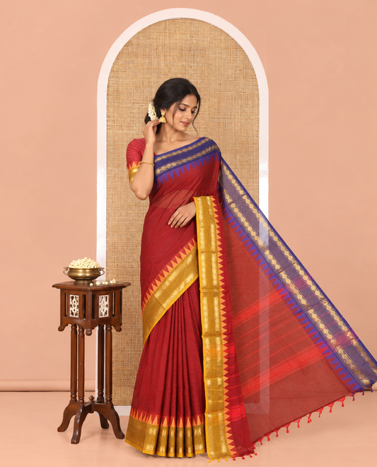 Maroon Plain Chettinad Cotton Saree, Complemented by a Contrast Rettai Pettu Rudraksham Temple Border,  Striped Pallu, and Matching Blouse