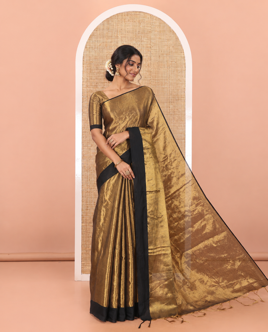Gold plain khadi tissue saree with a self-pallu, and a matching blouse