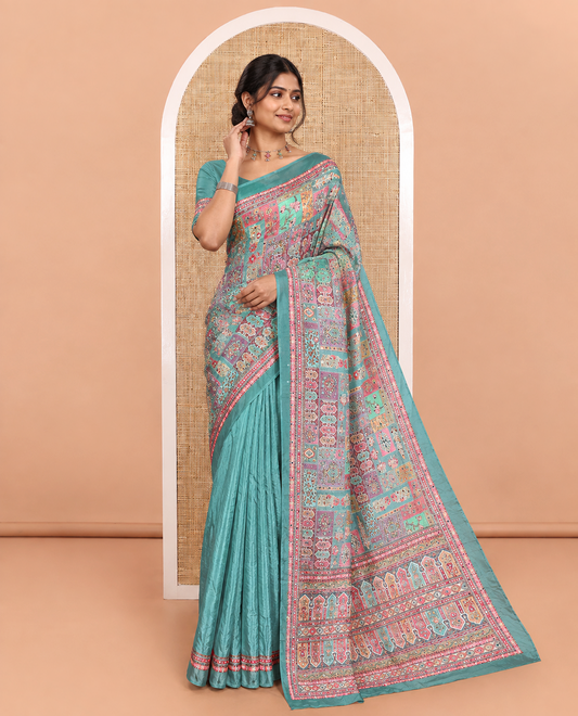 Pista Masakali Saree Featuring Floral and Mughal-Style Motifs Print and Mirror Work, Self-Printed Border, Pallu Decked Up with Colorful Mughal-Inspired Motifs Print, and a Matching Printed Blouse