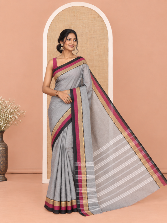 Grey Plain Chettinad Cotton Saree, Complemented by Contrast Traditional Design Temple Border, a Pallu Steeped with Stripes, and Has a No Blouse