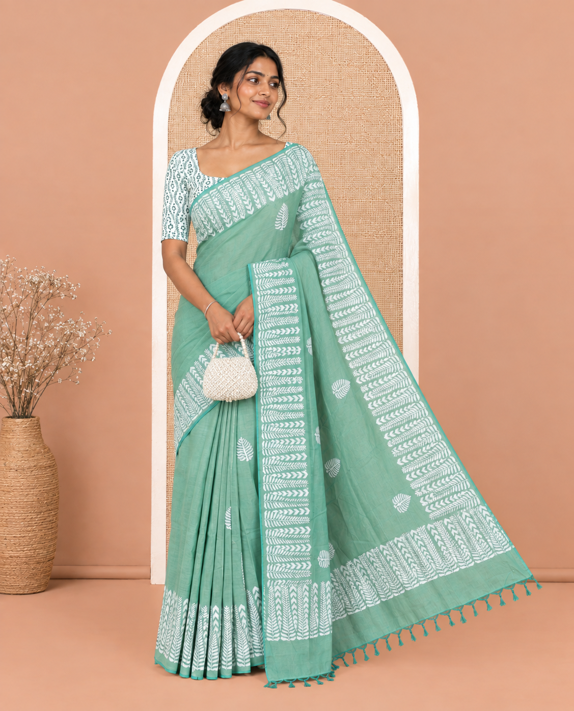 Green South Cotton Saree Features Tree Block-Print, a Bold Block-Printed Border, and a Contrast Blouse