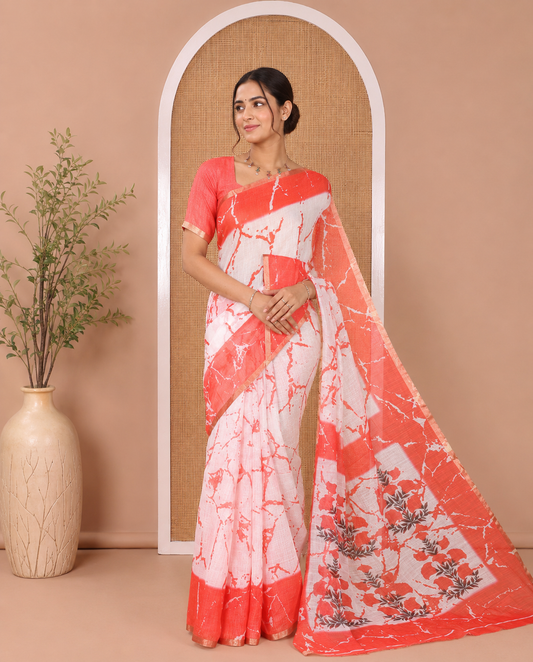 Cream and Red Linen Cotton Saree, Elevated with Batik Print on Its Body, Complemented by Contrast Batik Printed Border, Pallu of Floral Print, and Paired with a Contrast Blouse