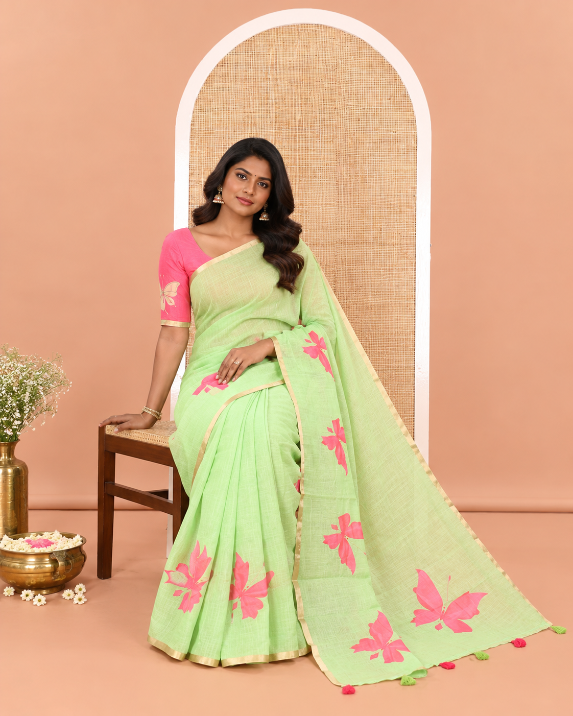Green Linen Cotton Saree, Adorned with Butterfly Buttas All Over Its Body, Subtle Piping Border, Pallu of Butterfly Print, and Paired with a Contrast Fairy Motifs Printed Blouse