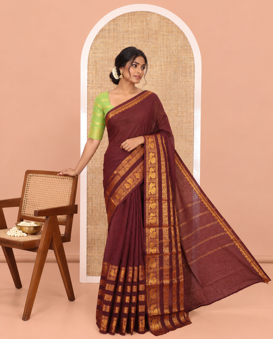 Coffee Brown Plain Sungudi Cotton Saree, Highlighted by Traditional Zari Border of Peacock and Floral Creeper Designs, Subtly Striped Pallu, and Paired with a Contrast Blouse