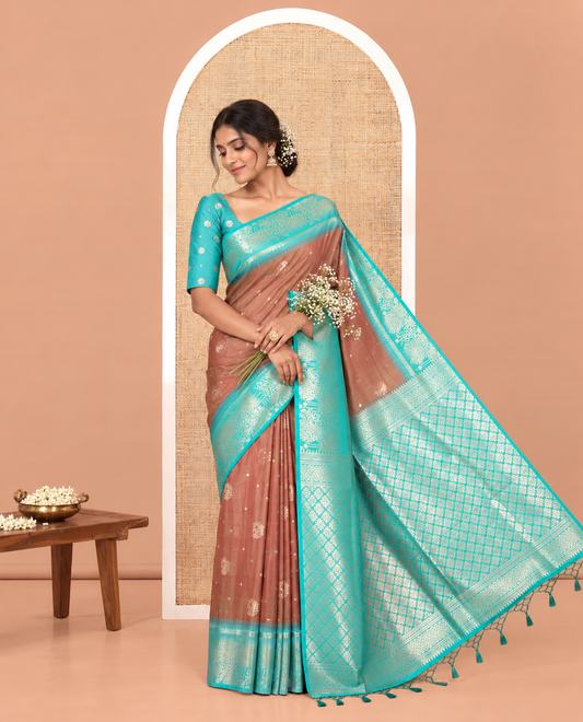 Mehendi Green Elite Soft Silk Saree, Detailed with Zari Buttas on Its Body, Complemented by a Contrast Peacock-Floral Zari Blouse, Intricately Designed Pallu, and Paired with a Contrast Blouse