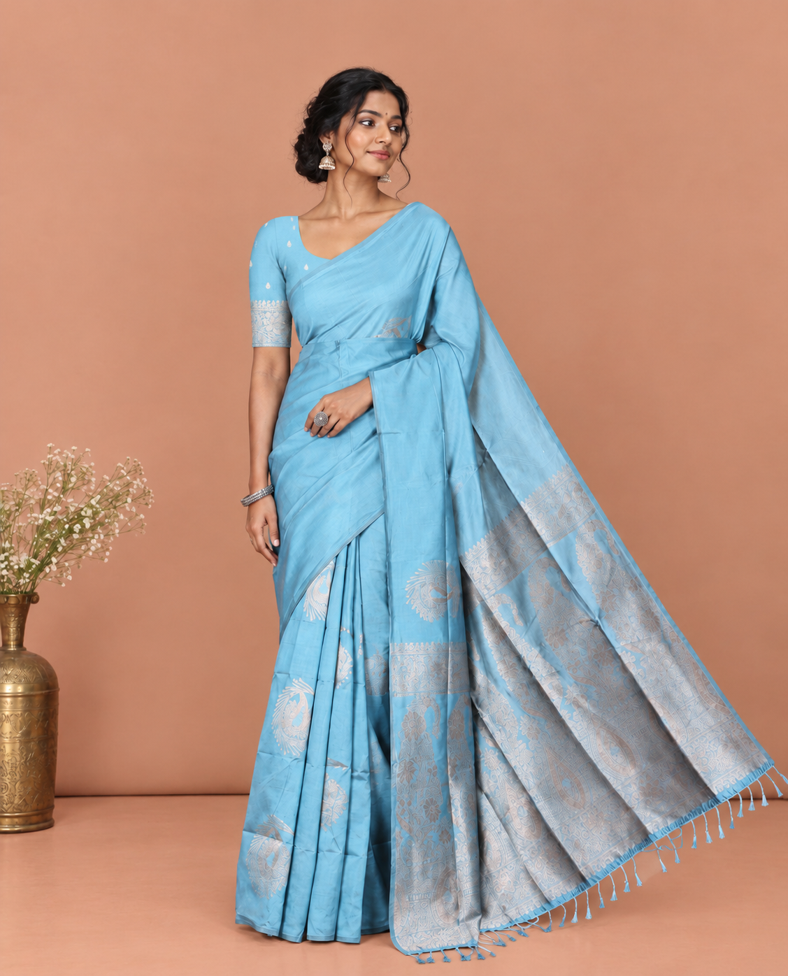 Borderless Sky Blue Kanchi Silk Saree, Elegantly Highlighted with Zari Buttas, Intricate Pallu, and a Matching Blouse
