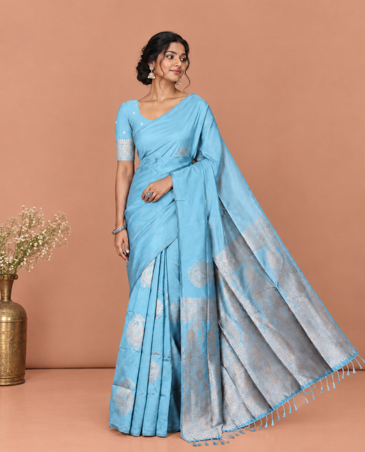 Borderless Sky Blue Kanchi Silk Saree, Elegantly Highlighted with Zari Buttas, Intricate Pallu, and a Matching Blouse
