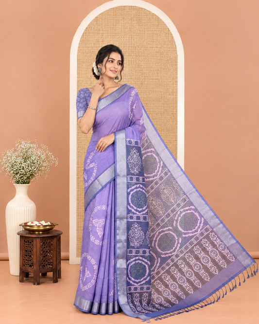 Lavender Linen Cotton Saree, Elevated with Shibori Printed on Its Body, Complemented by a Contrast Bavanji Zari Border, Handblock Printed Pallu, and Paired with a Contrast Blouse