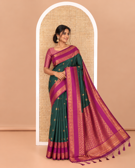 Green copper zari buttas elite soft silk saree , contrast zari weaving border , contrast brocade rich pallu with tussels , and  contrast brocade blouse