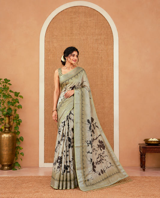 Green Linen Cotton Saree, Embellished with Silhouette-Style Floral Motifs Printed on Its Body, Subtle Zari Bavanji Border, Pallu of Silhouette-Style Floral Print, and Comes with a Matching Blouse