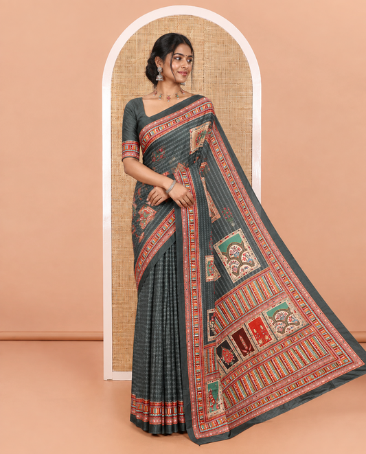 Bottle Green Masakali Saree Featuring Leaf Vine and Mughal-Style Motifs Print and Mirror Work, Kaleidoscopic-Colored Printed Border, Pallu Adorned with Colorful Intricate Pattern Print, and a Matching Blouse