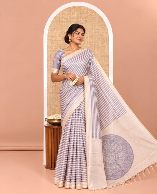 Grey Semi-Tussar Saree Featuring Horizontal Stripe Prints, Accentuated by a Subtle Resham Thread Temple-Designed Border, with a Pallu Highlighted by Intricate Circular Motifs, Paired with a Contrast Bandhani Blouse