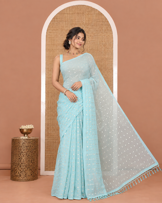 Borderless Light Blue Shimmer Saree, Gleamed up with Zari Buttas All Over Its Body, Pallu Mirrors the Same Buttas, and Comes Without a Blouse