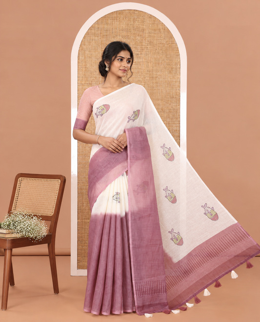 Borderless Cream and Onion Pink Linen Cotton Saree, Embellished with Half-and-Half Style Fish Motifs Printed All Over Its Body, Pallu Mirrors the Same Print, and Is Paired with a Contrast Blouse