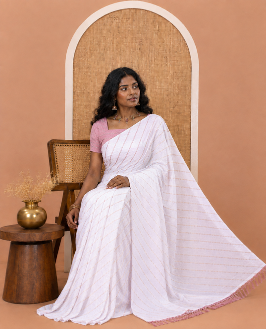Borderless White-Onion Pink Rangoli Chiffon Saree, Gleamed Up with Foil-Printed Leheriya Stripes, a Contrast Sequins Blouse