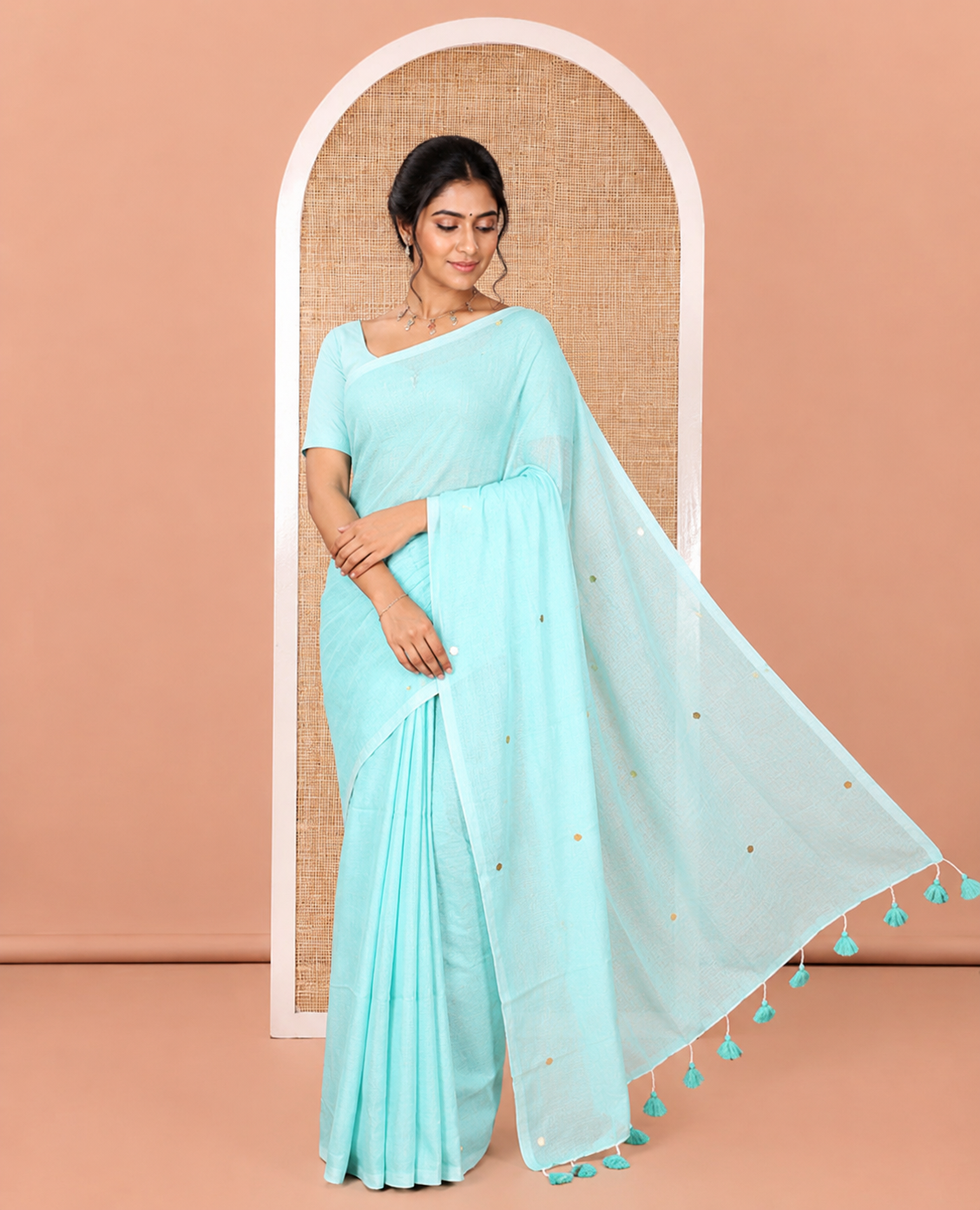 Borderless Sea Green Mul Cotton Saree, Subtly Sparkled With Big Sequins Work On Its Body, a Self-Pallu and Paired with a Matching Blouse
