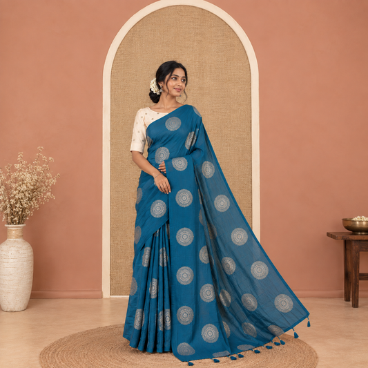 Borderless Blue Vichitra Saree Features Rangoli-Style Round Buttas Foil Print and a Contrast Sequins Embroidered Blouse