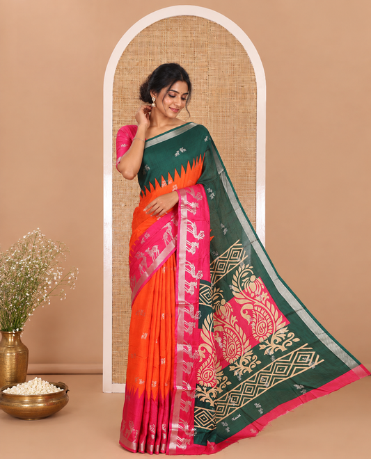Orange deer zari motifs dola silk saree, contrast green-pink ganga jamuna deer motifs zari woven border, paisley-diamond printed pallu, and a contrast deer motifs blouse