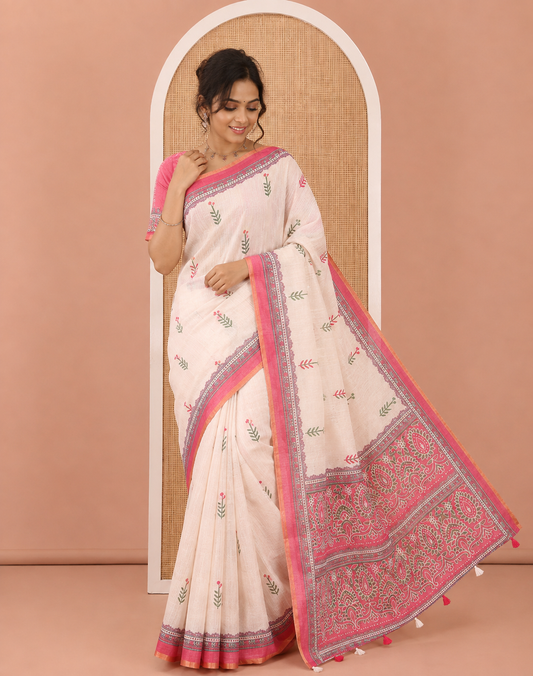 Cream-Pink Linen Cotton Saree Features Floral Buttas, Contrast Printed Border, Intricate Pallu, and a Contrast Blouse