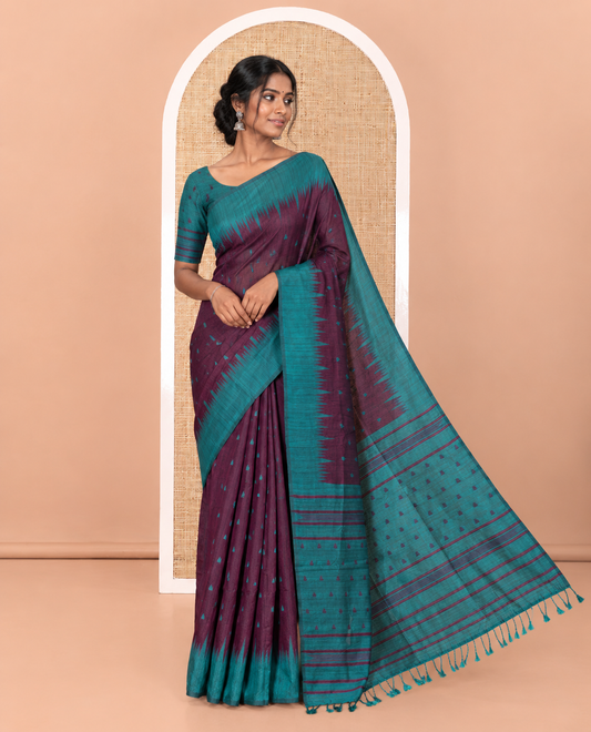 Purple buttas semi-jute saree with contrast temple border, thread striped pallu, and a contrast thread buttas blouse