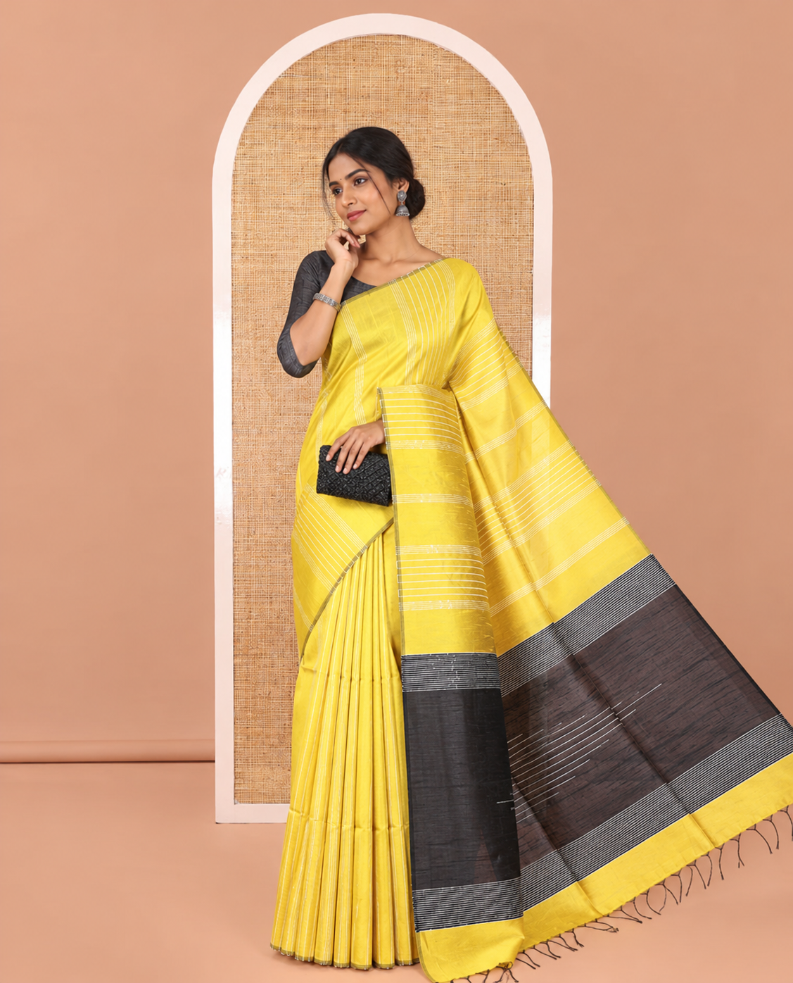 Borderless Yellow-Black Semi-Raw Silk Saree, Decorated with Sequined Stripes, a Contrast Zari Striped Pallu, and Contrast Blouse