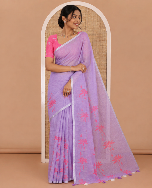 Lavender Pichwai lotus printed linen cotton saree, piping zari border, colorful tasselled lotus printed pallu, and a contrast lotus printed blouse