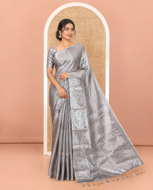 Borderless grey plain khadi tissue saree self pallu with tassels  and a matching blouse