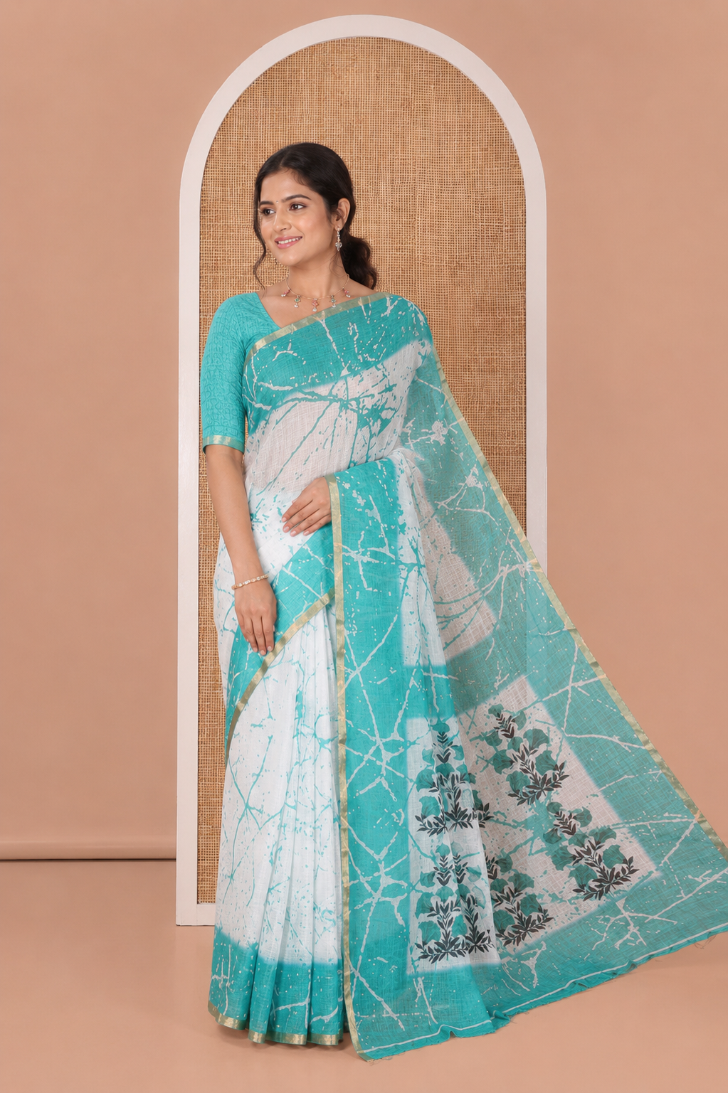 Cream and Rama Linen Cotton Saree, Decorated with Batik Print on Its Body, Complemented by Contrast Batik Printed Border, Pallu of Floral Print, and Paired with a Contrast Blouse