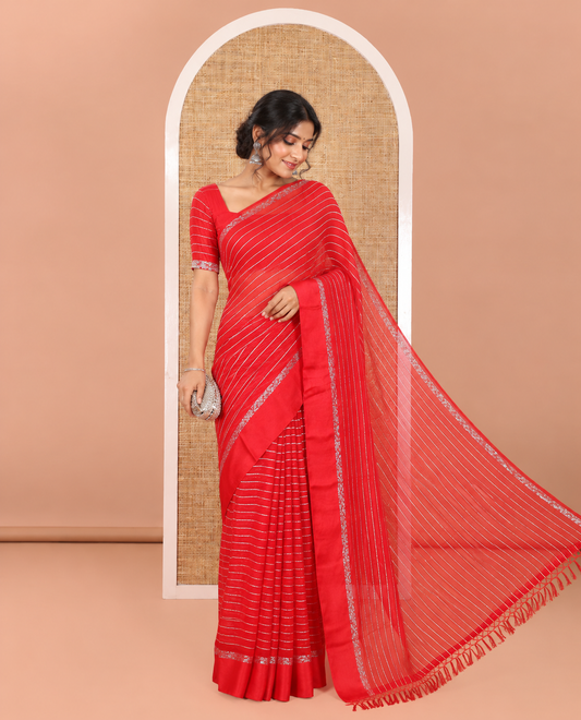 Red Viscose Georgette Saree Gleamed with Horizontal Golden Zari Stripes All Over Its Body, Accentuated by a Satin Plain Border, a Self Pallu Featuring the Same Horizontal Stripes, and Paired with a Running Blouse