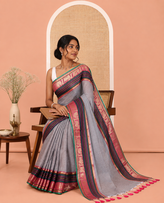 Grey Plain Khadi Mul Cotton Saree, Complemented by Contrast Yaali-Peacock Traditional Border, Self-Pallu, and No Blouse