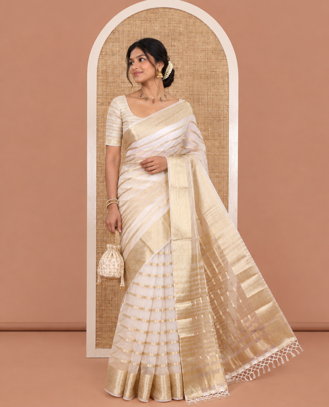 Cream Semi-Organza Saree, Uniquely Detailed with Zari Stripes, Highlighted by a Zari Traditional Border, and a Matching Blouse