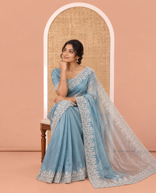 Blue Twill Net Saree, Gleamed Up with Stone Work, Highlighted by a Scallop Embroidered Border and Paired with a Matching Blouse