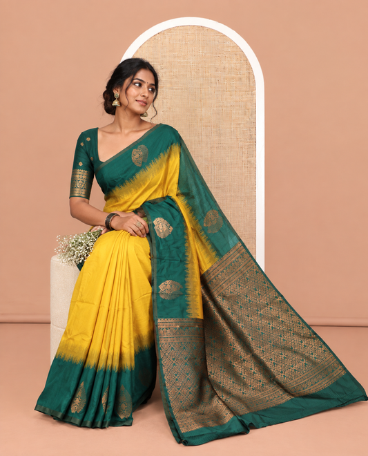 Mustard-Green Kanchi Silk Saree, Adorned with Zari Buttas, a Contrast Zari Butta Border, Grand Pallu, and a Contrast Blouse