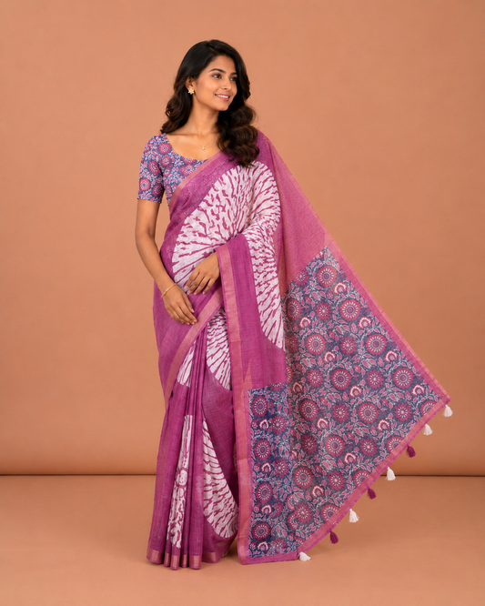 Magenta Linen Cotton Saree, Finely Crafted with Floral Motifs Printed on Its Body, Subtle Piping Border, Complemented by a Contrast Floral Printed Blouse, and Paired with a Contrast Blouse