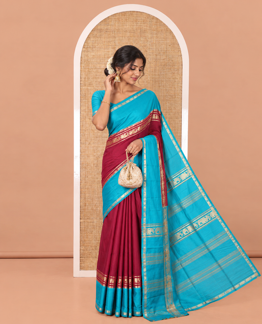 Purple Plain Art Mysore Silk Saree, Complemented by Captivating Contrast Rettai Pettu Traditional Border of Elephant Zari Buttas, Striped Pallu, and Paired with a Contrast Blouse