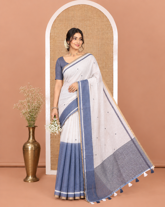 White and Grey Linen Cotton Saree, Adorned with Half-And-Half Double Color and Mirror Work on Its Body, Subtle Piping Border, Pallu Steeped with Stripes, and Paired with a Contrast Blouse