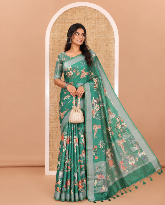 Green tropical floral and fauna motifs printed fancy tussar saree, resham border, self-pallu, and a matching blouse of print with resham thread stripes