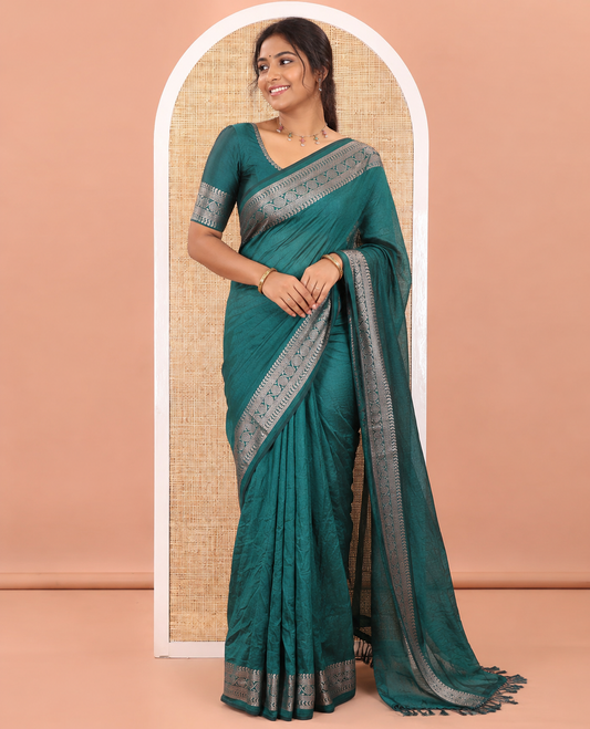 Green Plain Vichitra Silk Saree Subtly Sparked with Self-Border Featuring Traditional Designs, Plain Pallu, and Comes Without Blouse
