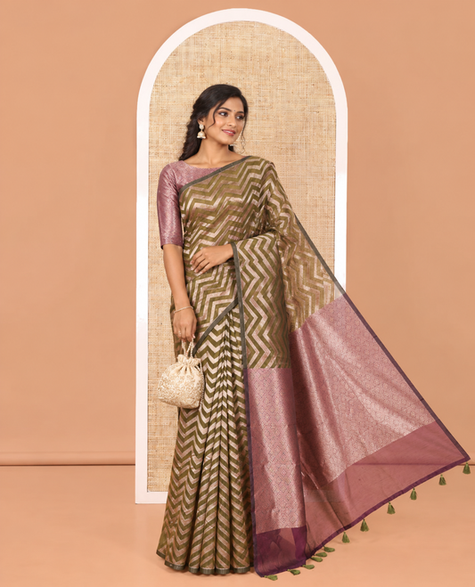 Borderless Green Chanderi Cotton Saree, Enriched with Chevron Zari Stripes on Its Body, Complemented by Contrast Intricate Jaal Pallu, and Paired with Contrast Blouse