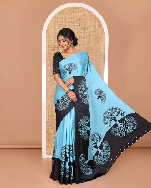 Blue tree motifs digitally printed Gajji silk saree with contrast printed border of upside down tree motifs, and contrast printed blouse