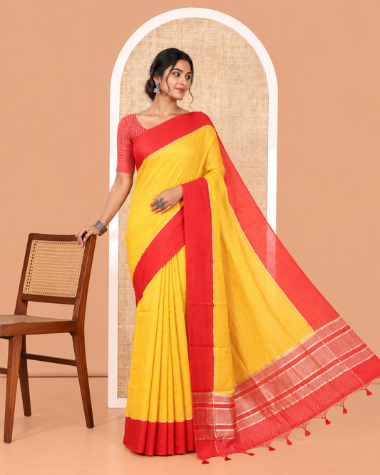 Yellow Assam Silk Saree, Subtly Sparkled with Zari Checked Design on Its Body, Complemented by Contrast Border, Pallu Steeped with Gleaming Zari Stripes, and Paired with a Contrast Blouse