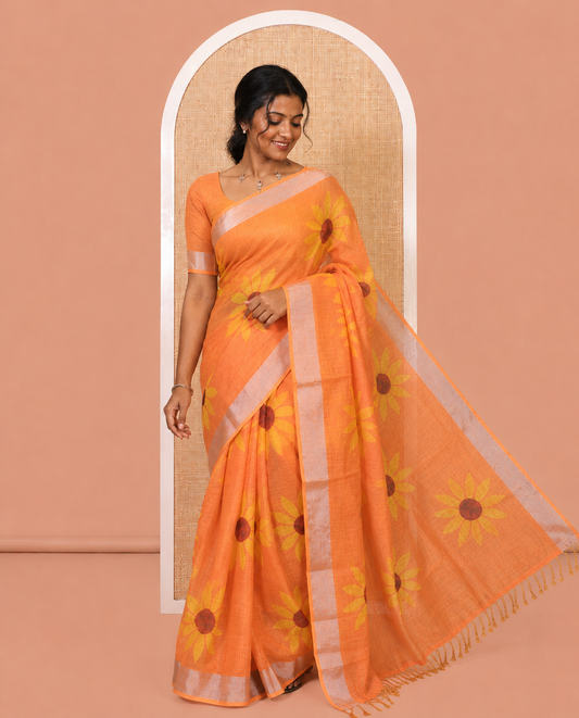 Orange Linen Cotton Saree, Beautified with Sunflower Print, a Zari Border, and a Matching Blouse