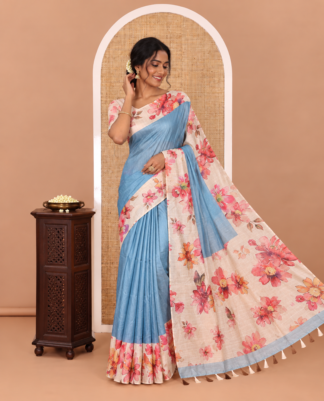 Blue plain fancy tussar digital printed saree, contrast floral digital printed border, floral printed pallu, and a floral printed blouse