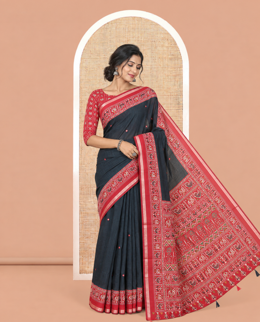 Black Manipuri Tussar Saree, Delicately Woven with Mirror Work, a Contrast Patola Animal Motif Border, Patola Pallu, a Contrast Blouse