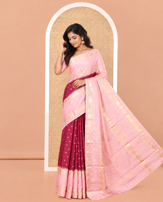Wine Art Mysore Silk Saree, Decorated with Zari Buttas All Over Its Body, Complemented by a Contrast Rettai Pettu Border of Two-Headed Eagle Designs, Pallu Steeped with Buttas and Stripes, and Paired with a Contrast Blouse