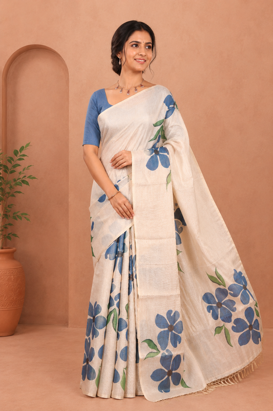 Borderless Cream-Blue Tissue Saree Features Floral Print, a Floral Printed Pallu, and a Contrast Blouse