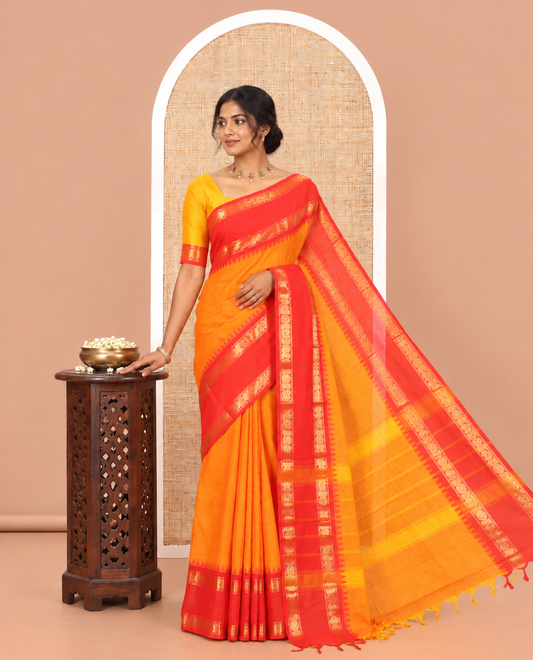 Orange Plain Chettinad Cotton Saree, a Contrast Rettai Pettu Peacock-Chakra Temple Border, Striped Pallu, a Matching Blouse