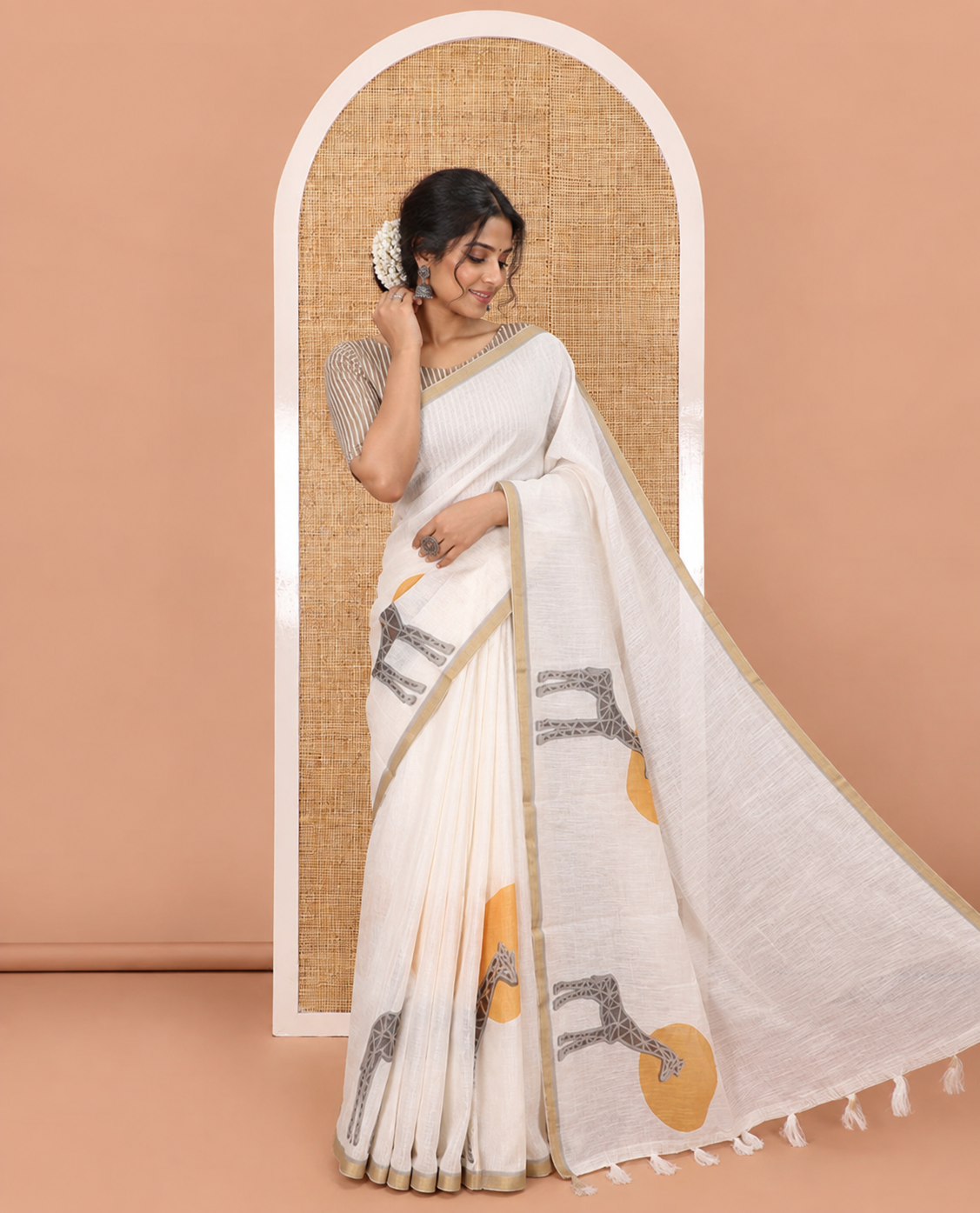 White plain & giraffe motifs printed linen cotton saree, zari piping border, giraffe printed pallu & vertical striped blouse